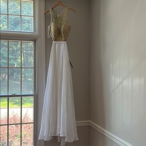 Beautiful La femme white and gold gown